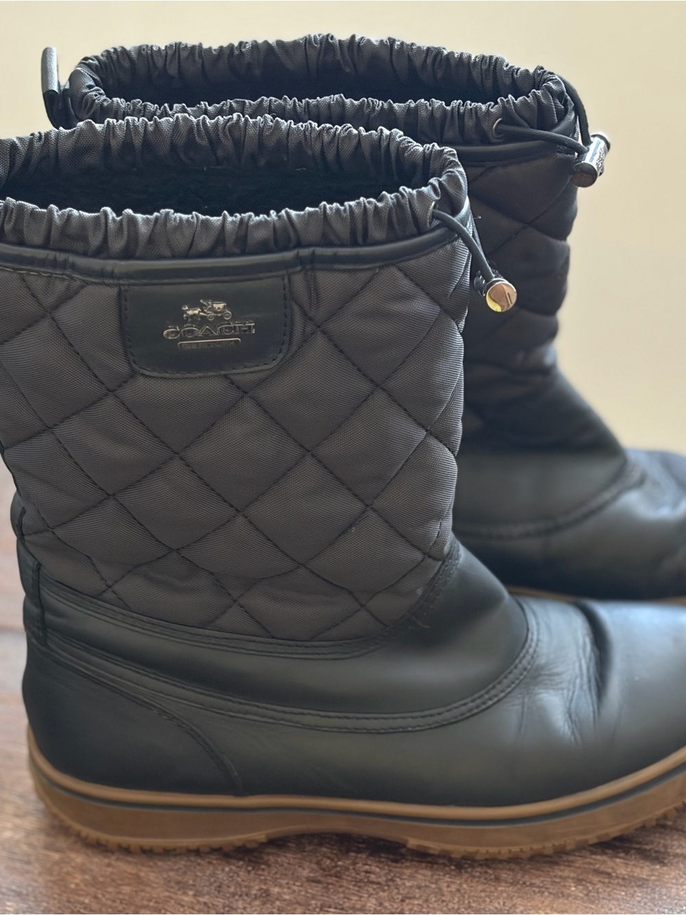 Coach Black Quilted Drawstring Winter Boots, size 10